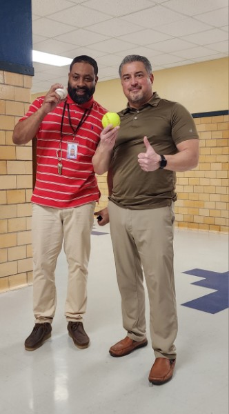  Coach Blakely (baseball) and Coach King (softball) are getting their teams ready.